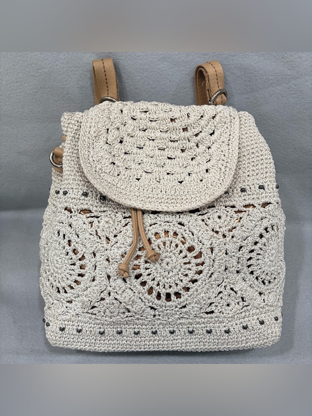 The Sak Sayulita Backpack Crochet Drawstring with Tan Straps